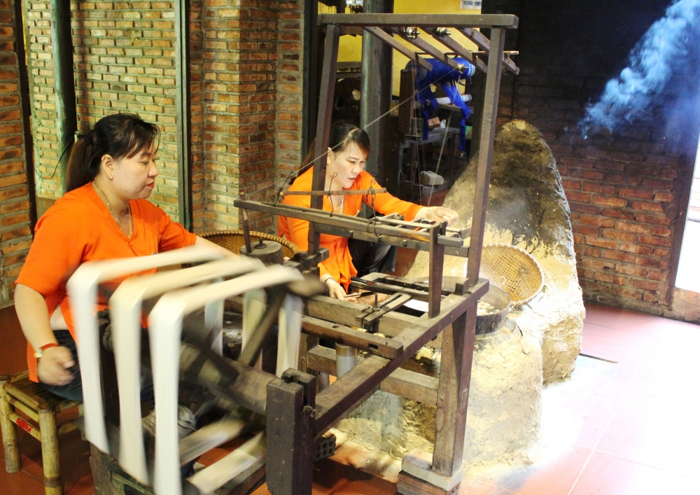 Silk weaving performed at the Hoi An Silk Village